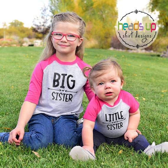 Big SisterLittle Sister Raglan ShirtsBodysuit New Sibling Annoucment Tees Big SisLittle Sis tshirts Raglan Photo Prop Trendy Gift Graphic Tee – Feel-Good Design · High-Quality Print