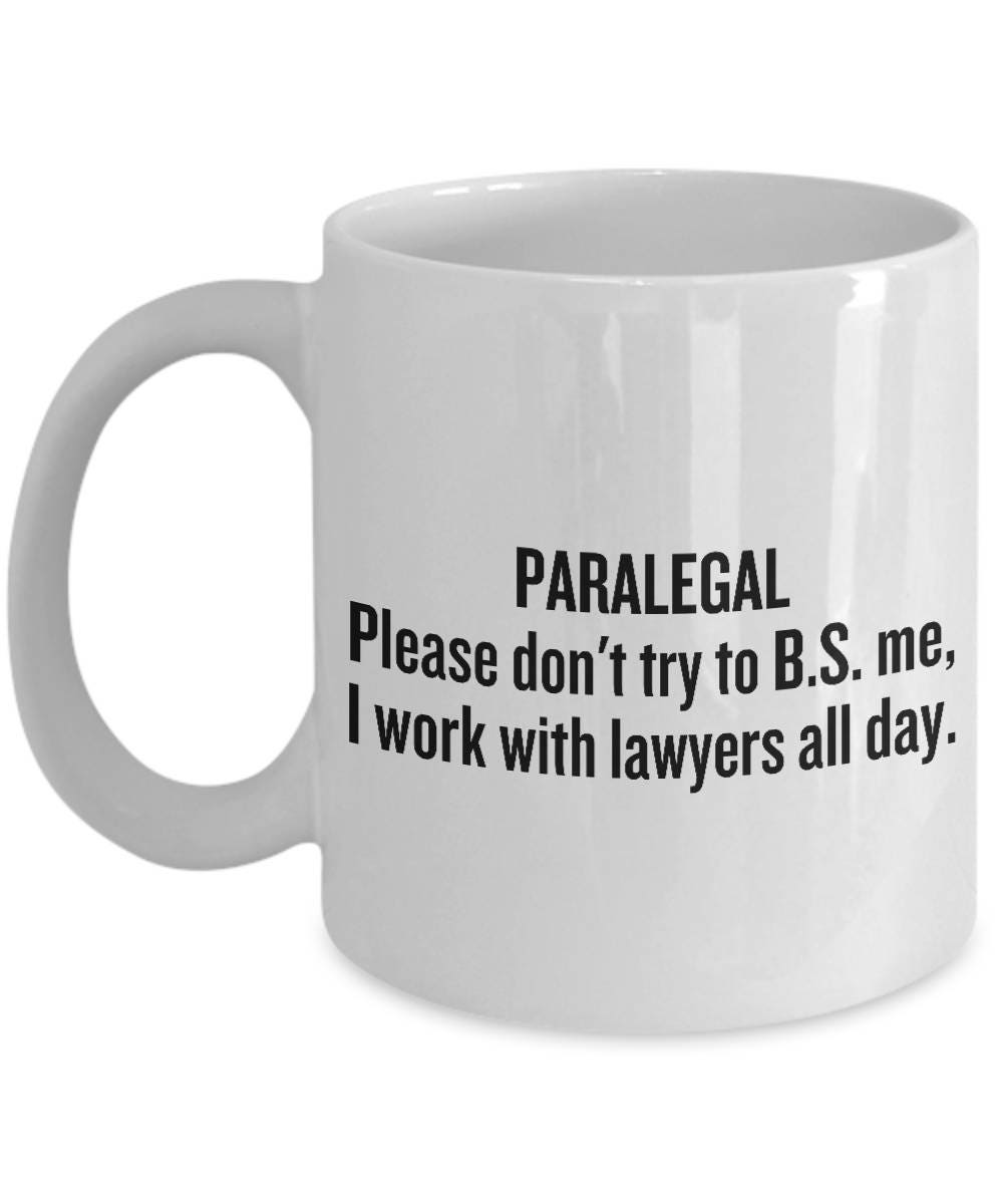 Paralegal Coffee Mug Paralegal Gift Idea Legal Assistant Present I Work With Lawyers All Day Graphic Tee – Feel-Good Design · Trending Graphic Apparel