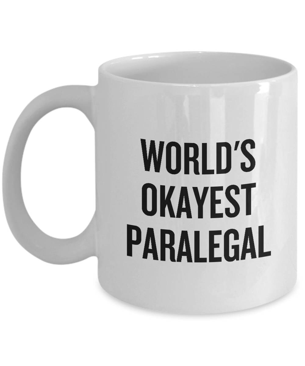 Funny Paralegal Gift World39s Okayest Paralegal Law Office Coffee Mug Small And Large Sizes Available Graphic Tee – Soft Feel · Must-Have Style