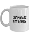 DJ Gift Drop Beats Not Bombs Coffee Mug EDM Hip Hop Graphic Tee – Aesthetic Look · Trending Graphic Apparel
