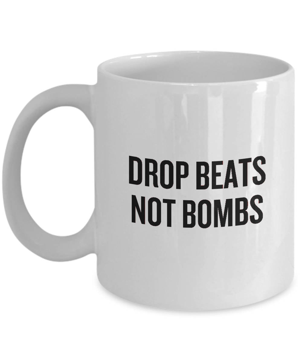 DJ Gift Drop Beats Not Bombs Coffee Mug EDM Hip Hop Graphic Tee – Aesthetic Look · Trending Graphic Apparel