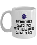 EMT Mother Mug Paramedic Mother Gift Mother39s Day Mother39s Birthday Present My Daughter Saves Lives EMT Father Gift Graphic Tee – Fan Favorite · Great Gift For Fans