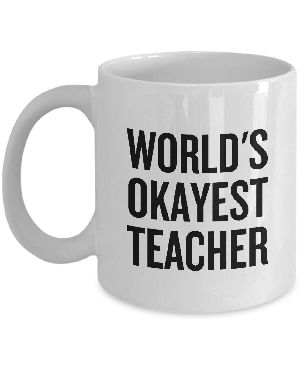 Funny Teacher Mug Schoolteacher Gift Idea Teaching Present Funny Teacher Gift Idea World39s Okayest Teacher Graphic Tee – Cozy Vibes · High-Quality Print