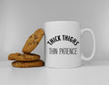 Thick Thighs Thin Patience Funny Slogan Mug Graphic Tee – Soft Feel · Trending Graphic Apparel