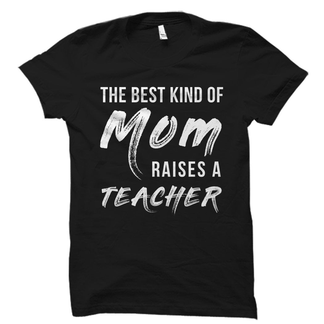 Teacher Mom Gift Mom of Teacher Gift Teacher Appreciation Gift Teacher Gifts Teacher Mom Shirt Proud Teacher Mom Raises a Teacher OS1640 Graphic Tee – Fan Favorite · Perfect For Daily Wear