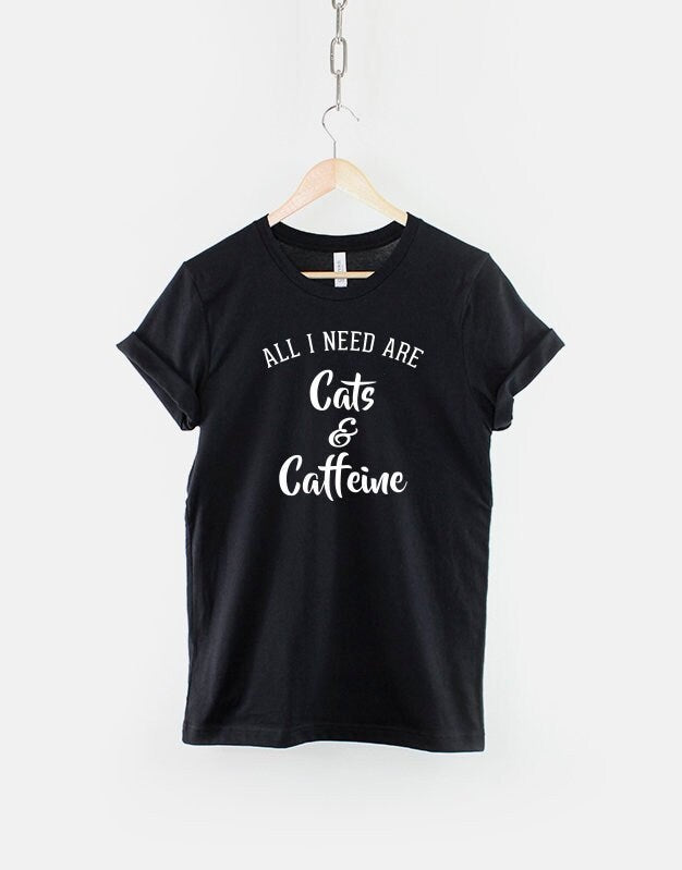 All I need Are Cats And Caffeine Cat Slogan TShirt Graphic Tee – Fan Favorite · Top Pick For Any Outfit