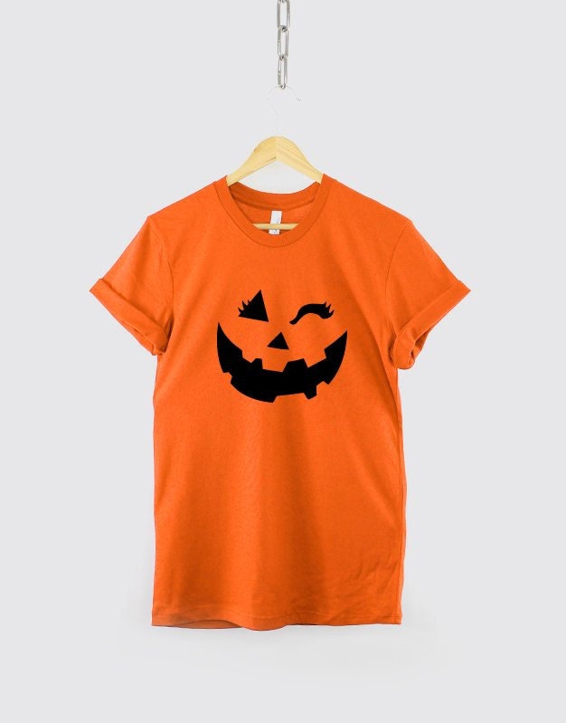 Girls Fun Halloween Winking Pumpkin Face TShirt Childrens Toddler Cute Halloween Trick Or Treat Shirt Graphic Tee – Premium Graphic · Trending Graphic Apparel
