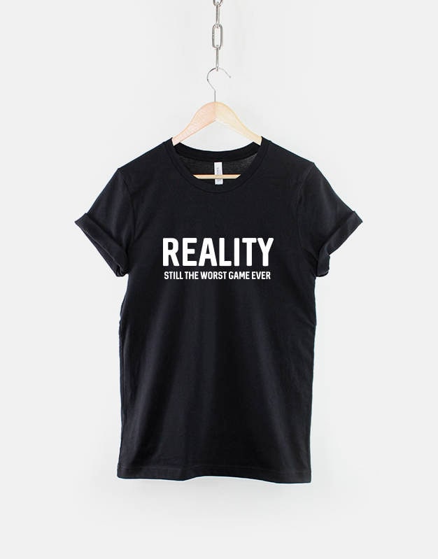 Reality Still The Worst Game Ever TShirt Gamer Fashion Slogan T Shirt Graphic Tee – Premium Graphic · High-Quality Print