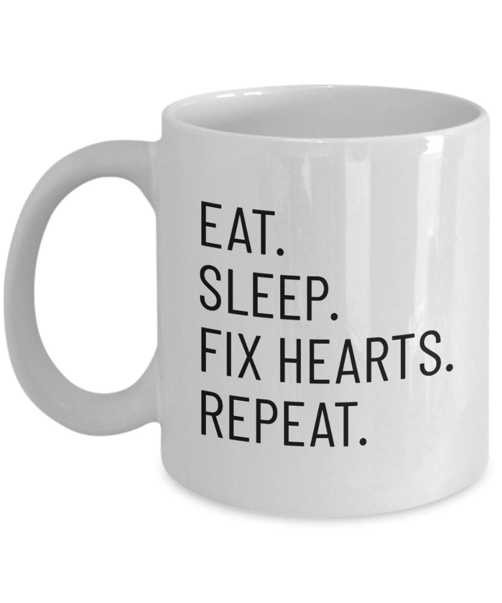 Cardiologist Mug Funny Cardiologist Gift Cardiology Coffee Mugs Eat Sleep Fix Hearts Repeat Graphic Tee – Aesthetic Look · Trending Graphic Apparel