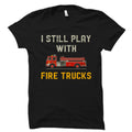 Funny Fireman Gift Firefighter Shirt Firefighter Gift Fire Chief Shirt Emergency Responder Shirt Still Play With Fire Trucks OS2170 Graphic Tee – Premium Graphic · Perfect For Daily Wear