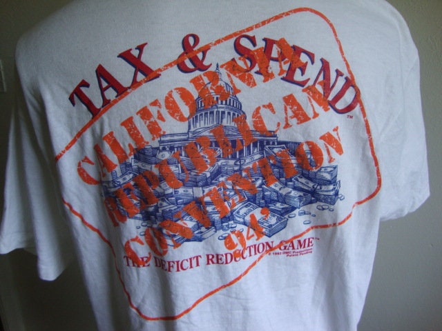 Vintage 8039s Tax Spend The Deficit Reduction Game T Shirt Size XL Graphic Tee – Warm & Stylish · Trending Graphic Apparel