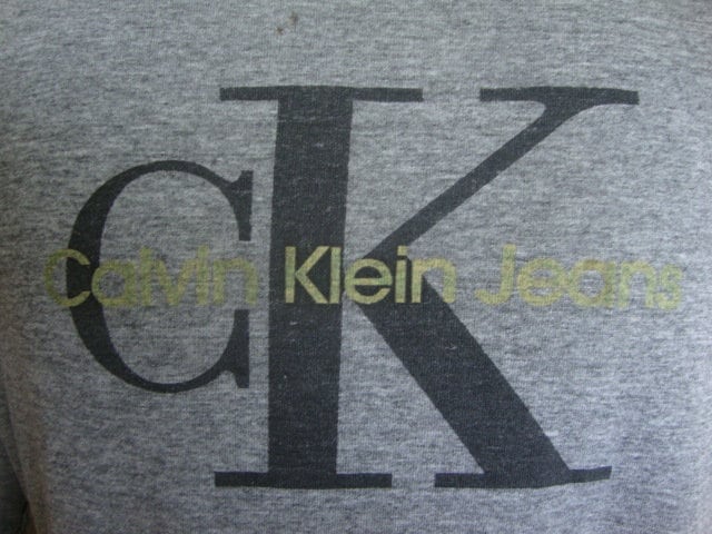 Vintage 9039s Calvin Klein Jeans Gray T Shirt Size XL Graphic Tee – Cozy Vibes · High-Quality Print