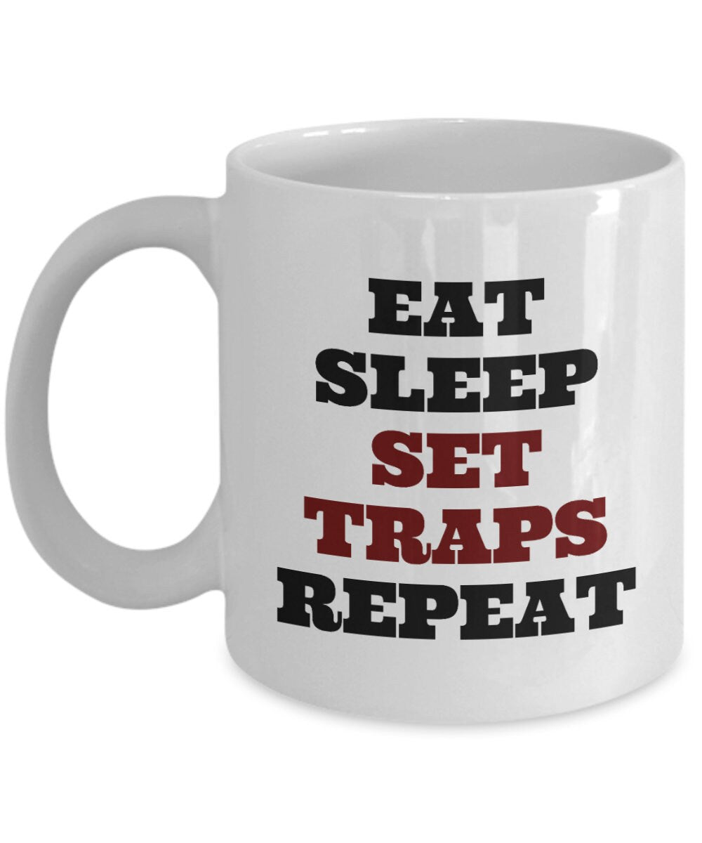 Trapping Coffee Mug Trapping Gift Funny Trapper Present Hunting Bushcraft Outdoor Activities Eat Sleep Set Traps Repeat Graphic Tee – Soft Feel · Top Pick For Any Outfit