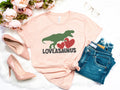 Loveasaurus Rex Boys Valentine Shirt Dinosaur Valentines Day Shirt Dinosaur Valentines Day Shirt For Boys DinosaurGift for Valentines Graphic Tee – Bold Style · Great Gift For Fans