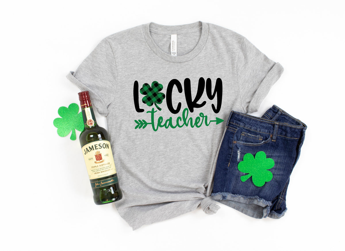 Lucky Teacher ShirtShamrock ShirtSaint Patricks Day ShirtSt Paddys Day ShirtLeprechaun ShirtSaint Patricks Day Teacher Shirt Graphic Tee – Premium Graphic · Top Pick For Any Outfit