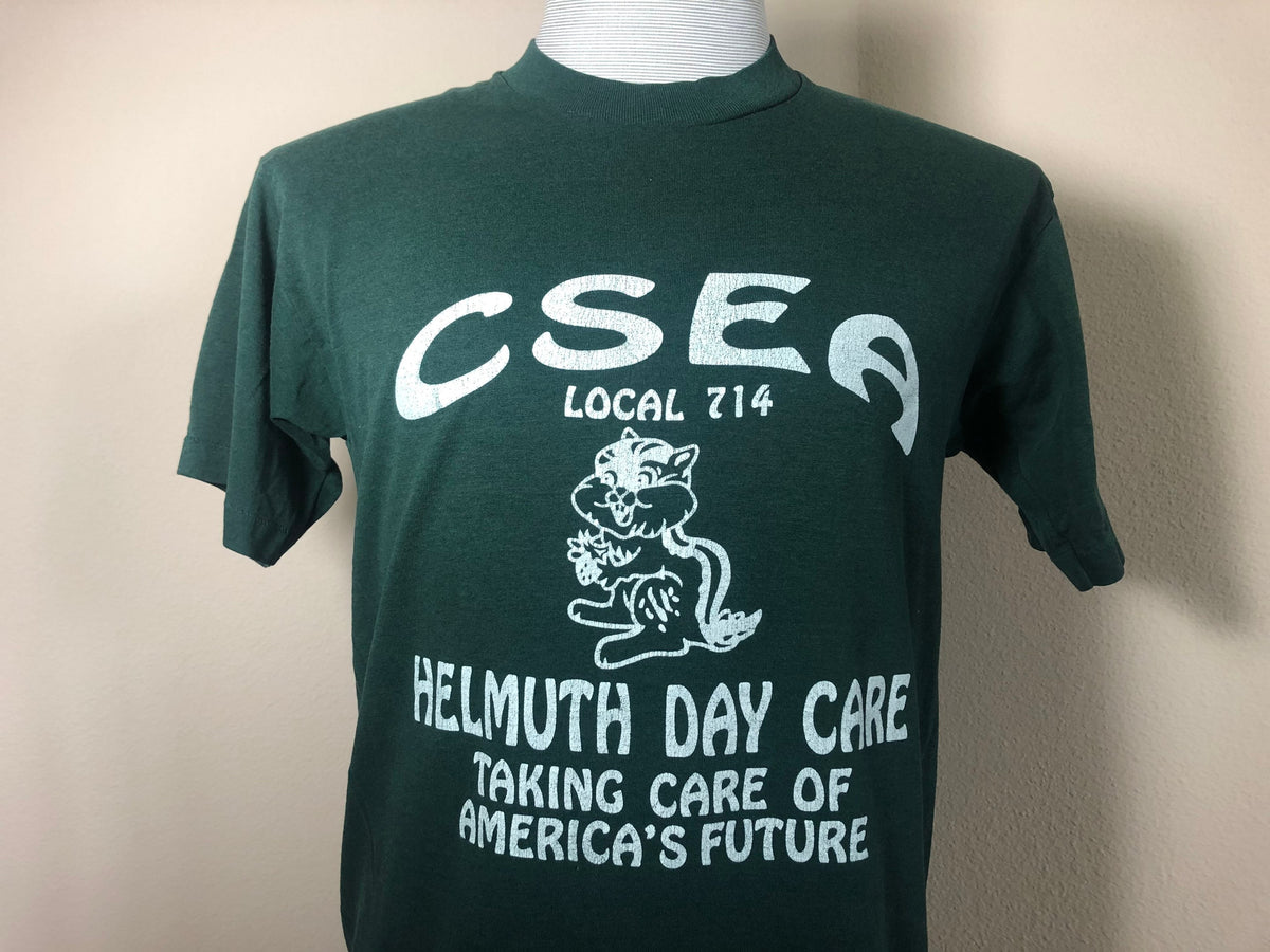 Vintage 90s CSEA Helmuth Day Care Green T Shirt Size M Graphic Tee – Easygoing Wear · Trending Graphic Apparel