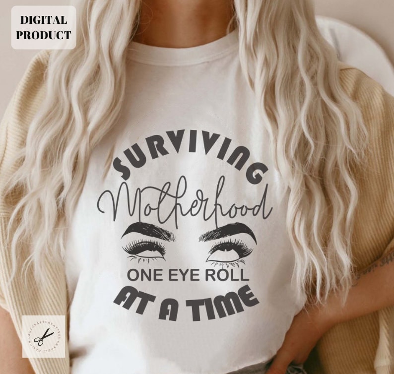 Surviving Motherhood svg Surviving Motherhood One Eye Roll At A Time svg Shirt PNG CRICUT SVG Graphic Tee – Cozy Vibes · Must-Have Style
