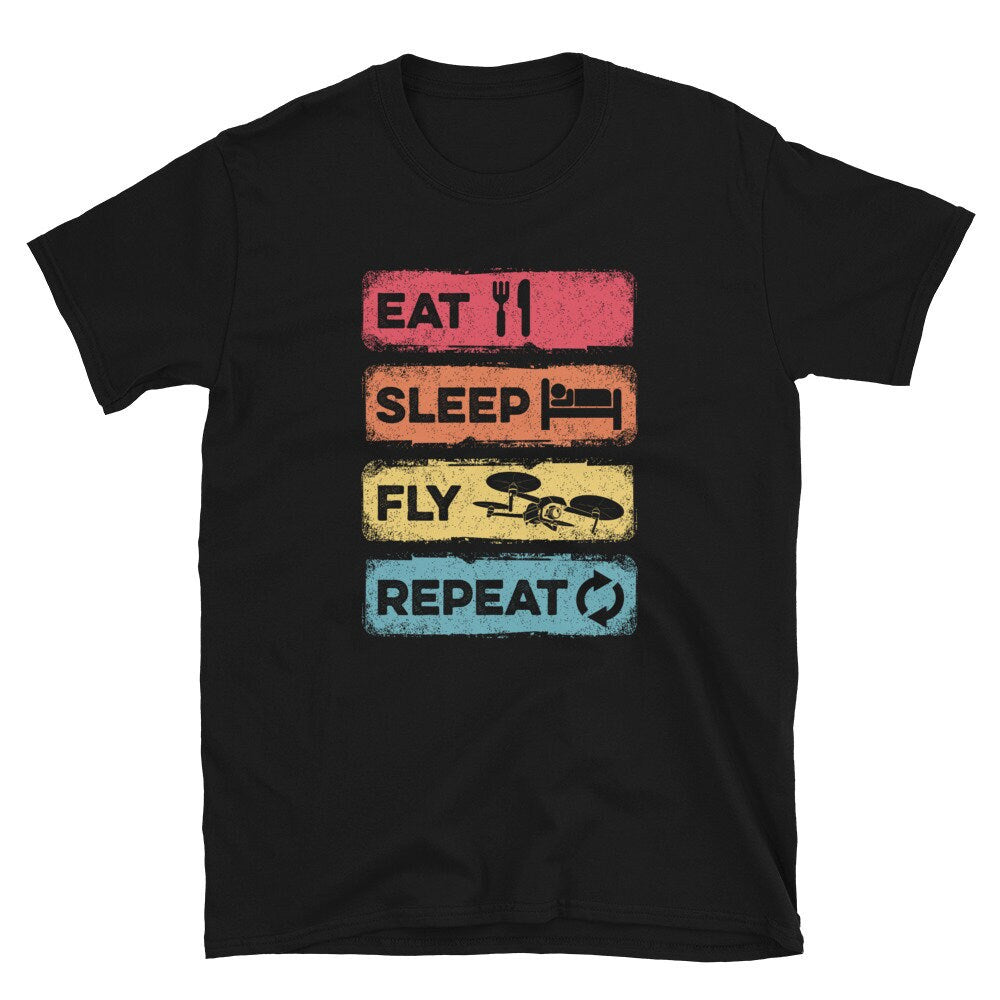 Eat Sleep Fly Repeat Retro Drone Pilot Unisex T Shirt Graphic Tee – Soft Feel · Great Gift For Fans