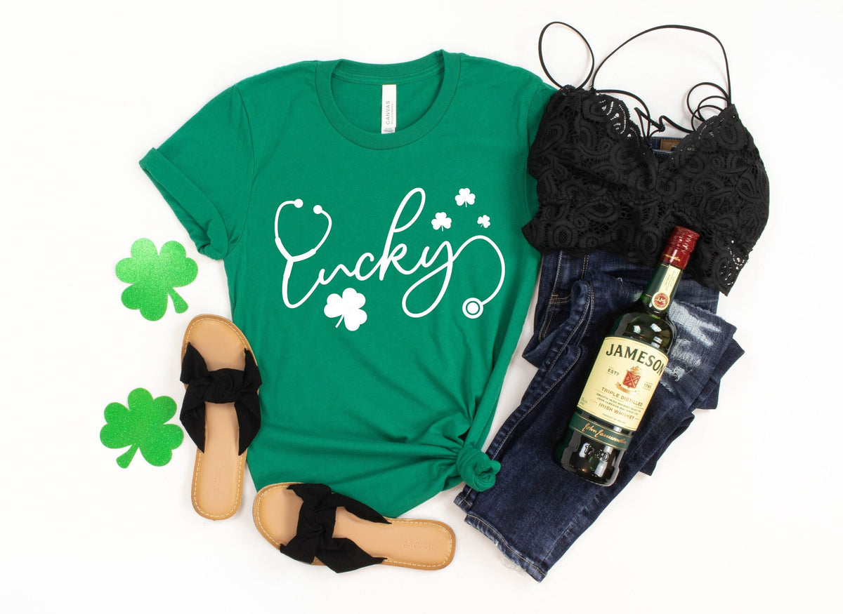 StPatricks Lucky Nurse ShirtIrish ShirtStPatricks Day shirtShamrock TeeNurse Stethoscope TShirtShamrock Lucky Nurse GiftIrish Nurse Graphic Tee – Premium Graphic · Great Gift For Fans