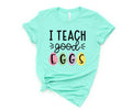 I Teach Good Eggs ShirtTeacher ShirtEaster Teacher Shirt Teacher TShirt Teacher TeePeeps TShirt Easter ShirtEaster Day Graphic Tee – Everyday Comfort · Perfect For Daily Wear
