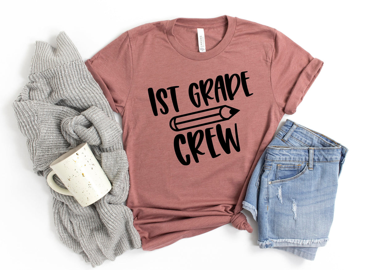 First Grade Crew ShirtFirst Grade Teacher ShirtTeacher GiftGift for TeachersTeacher Shirt1st Grade Teacher ShirtBack to School Shirt Graphic Tee – Soft Feel · Perfect For Daily Wear