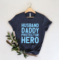 Husband Gift Husband Daddy Protector Hero Fathers Day Gift Funny Shirt Men Dad Shirt Wife to Husband GiftFather Birthday Gift Graphic Tee – Premium Graphic · Perfect For Daily Wear