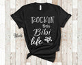 Rockin This Bibi Life Grandma Tshirt African or Swahili Grandmother Gift Idea for Mother39s Day Birthday Christmas or Pregnancy Reveal Graphic Tee – Aesthetic Look · Trending Graphic Apparel