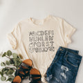 Alphabet Doodle Teacher Tshirt Teaching shirt First Grade TeacherKindergarten Teacher Teacher Shirt Kindergarten ShirtGift For Teacher Graphic Tee – Cozy Vibes · High-Quality Print