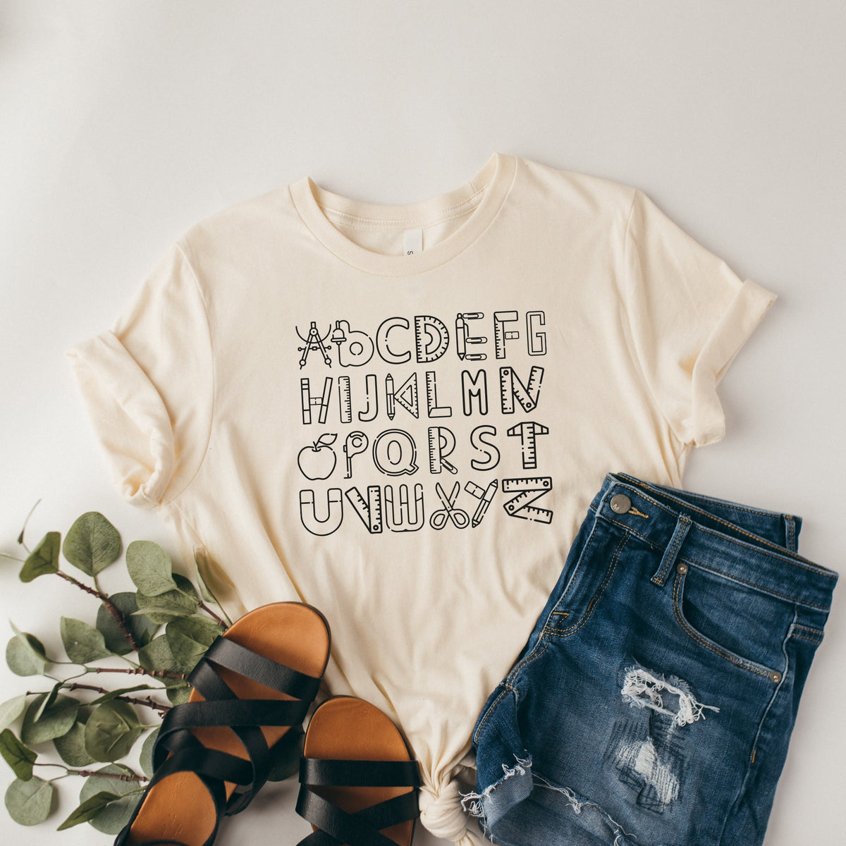 Alphabet Doodle Teacher Tshirt Teaching shirt First Grade TeacherKindergarten Teacher Teacher Shirt Kindergarten ShirtGift For Teacher Graphic Tee – Cozy Vibes · High-Quality Print