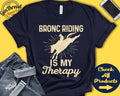 Bronc Rider Shirt Bronc Riding Is My Therapy Rodeo Gift Wild West Western Hold Your Horses Sports Tank Hoodie A2124 Hoodie – Warm & Stylish · Great Gift For Fans