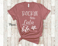 Rockin This Lala Life Tshirt Grandmother Gift Great Birthday Mother39s Day or Christmas Gift from Grandkids for Grandma Graphic Tee – Feel-Good Design · Great Gift For Fans