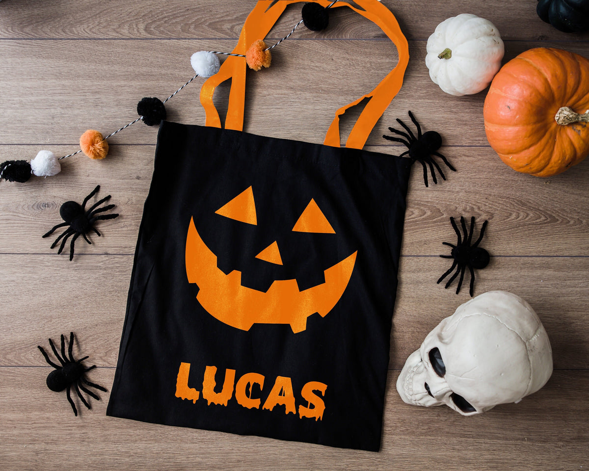 Personalised Trick Or Treat Candy Bag Halloween Decor Custom Name Halloween Pumpkin Tote Bag Tote Bag – Warm & Stylish · High-Quality Print