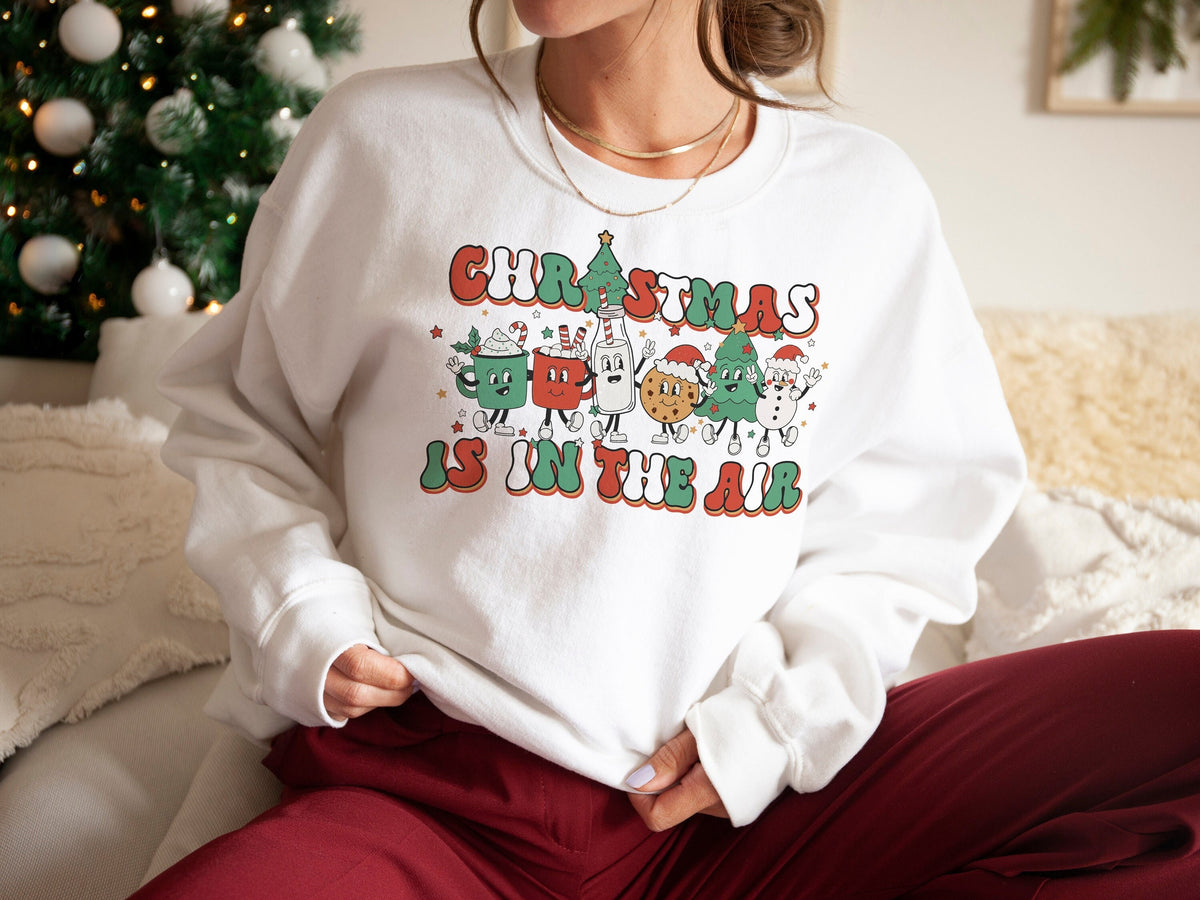Retro Christmas Sweatshirt Womens Christmas Sweater Christmas Is In The Air Festive Sweatshirt Retro Christmas Characters Sweatshirt Sweatshirt – Cozy Vibes · Must-Have Style