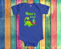 Nino39s Boy Cute Godfather Name Dinosaur Baby Bodysuit Tshirt or Toddler Shirt for a Spanish Godfather Gift or Pregnancy Reveal Announcement Graphic Tee – Premium Graphic · Must-Have Style