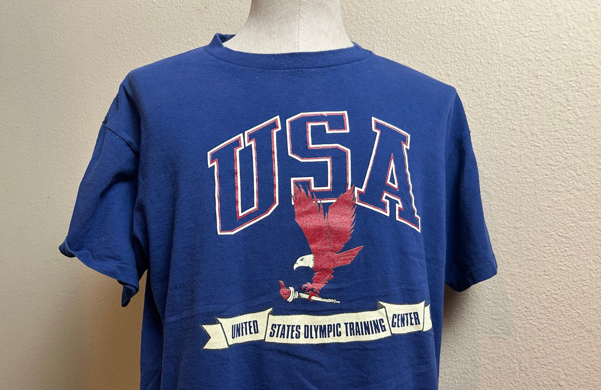 Vintage 8039s USA Olympic Training Center Olympics Navy Blue T Shirt Size L Graphic Tee – Bold Style · High-Quality Print
