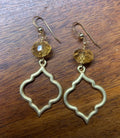 Gold Crystal on Gold Quatrefoil Frame Earrings Graphic Tee – Fan Favorite · Top Pick For Any Outfit