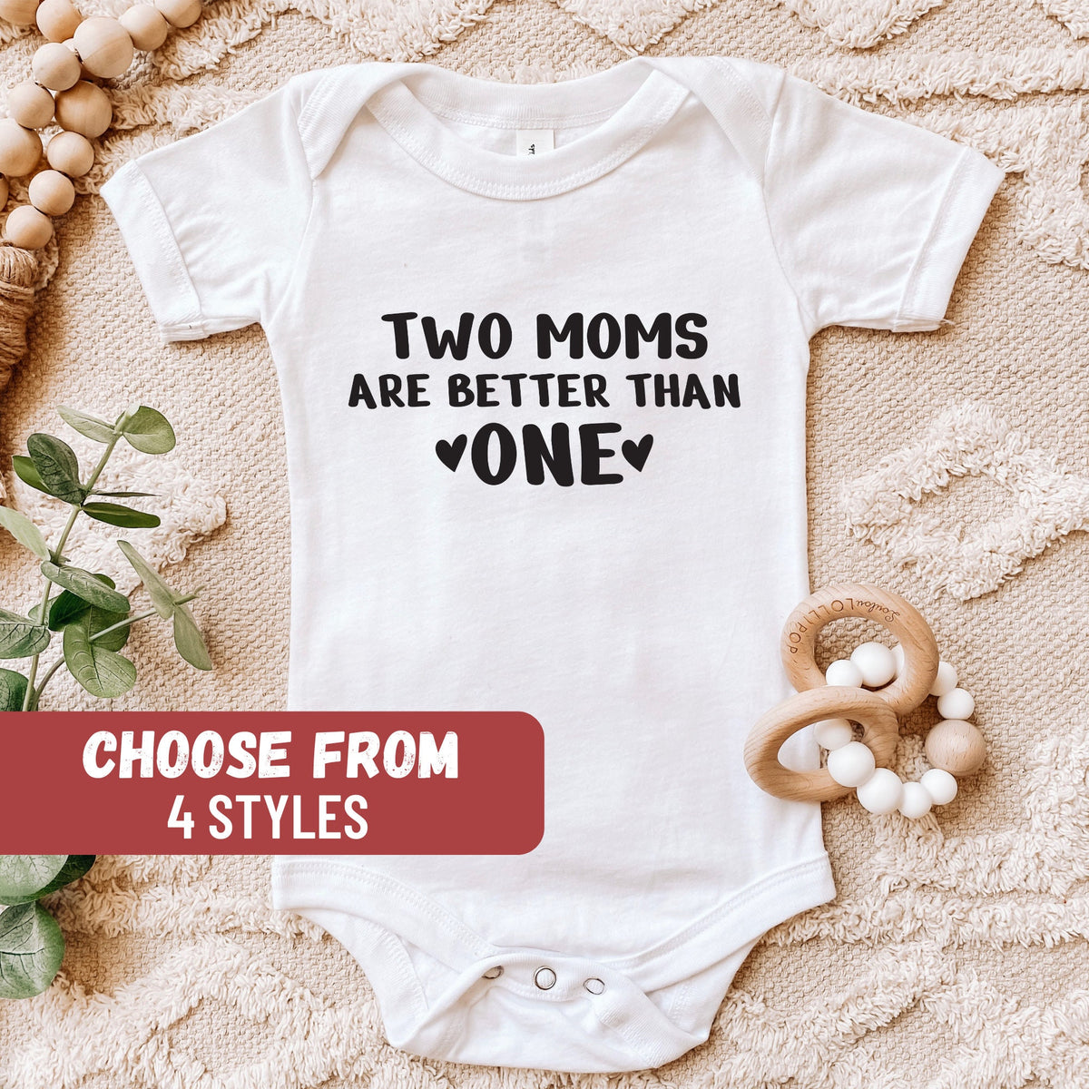 Lesbian Mom Baby Bodysuit LGBT Baby Bodysuit Lesbian Pregnancy LGBT Baby Outfit Two Moms Are Better Than One Baby Bodysuit Graphic Tee – Premium Graphic · Trending Graphic Apparel