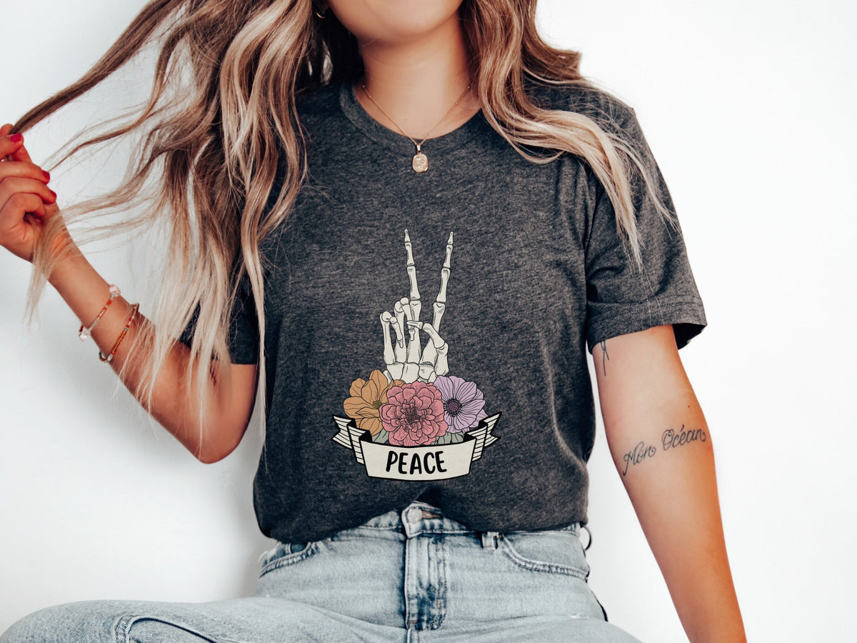 Cute Floral Skeleton Hand Peace Sign Halloween T shirt for Women Womens Fun Spooky Season Pretty Fall Halloween Skeleton Tee Gift for Her Graphic Tee – Premium Graphic · Trending Graphic Apparel