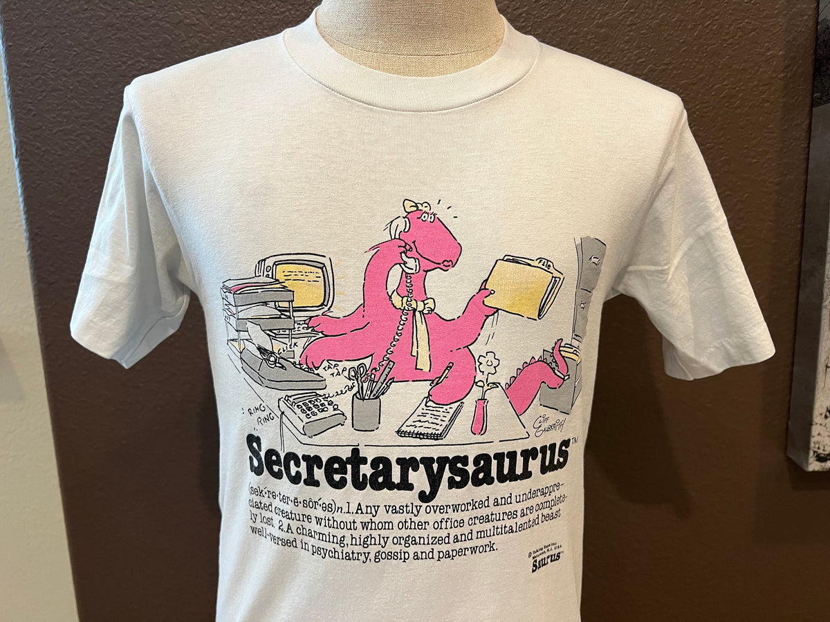 Vintage 8039s Secretarysaurus Secretary Dinosaur by Cliff Galbraths Saurus White T Shirt Size M Graphic Tee – Aesthetic Look · Must-Have Style