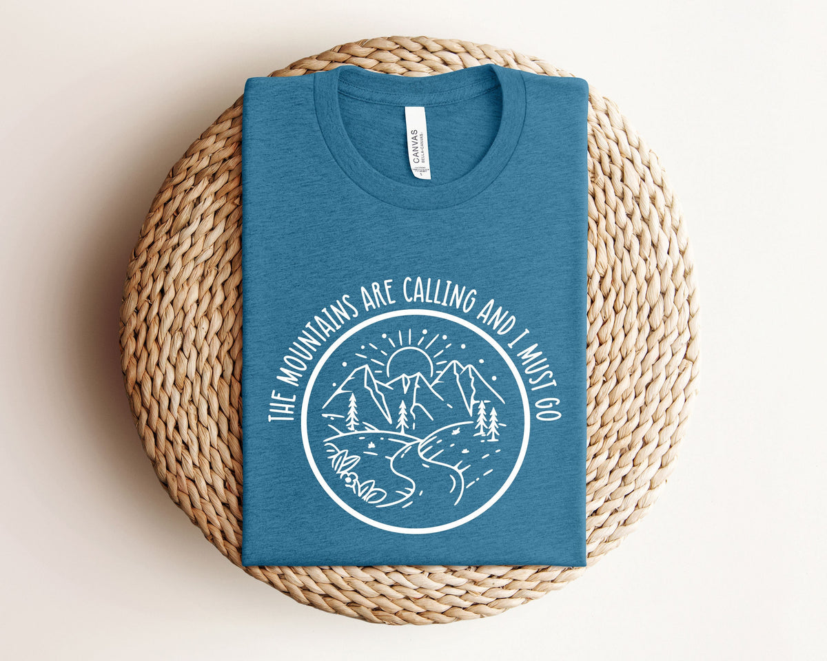 The Mountains Are Calling and I Must Go Shirt Camp Shirt Hiking Shirt Mountain Shirt Mountains Shirt Camping Shirt Nature Shirt Graphic Tee – Warm & Stylish · Trending Graphic Apparel