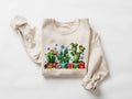 Christmas Cactus sweater Festive Plant Mom Christmas sweatshirt Christmas Plant Mom Gift Cactus With LightsChristmas Gift Sweatshirt – Cozy Vibes · Must-Have Style