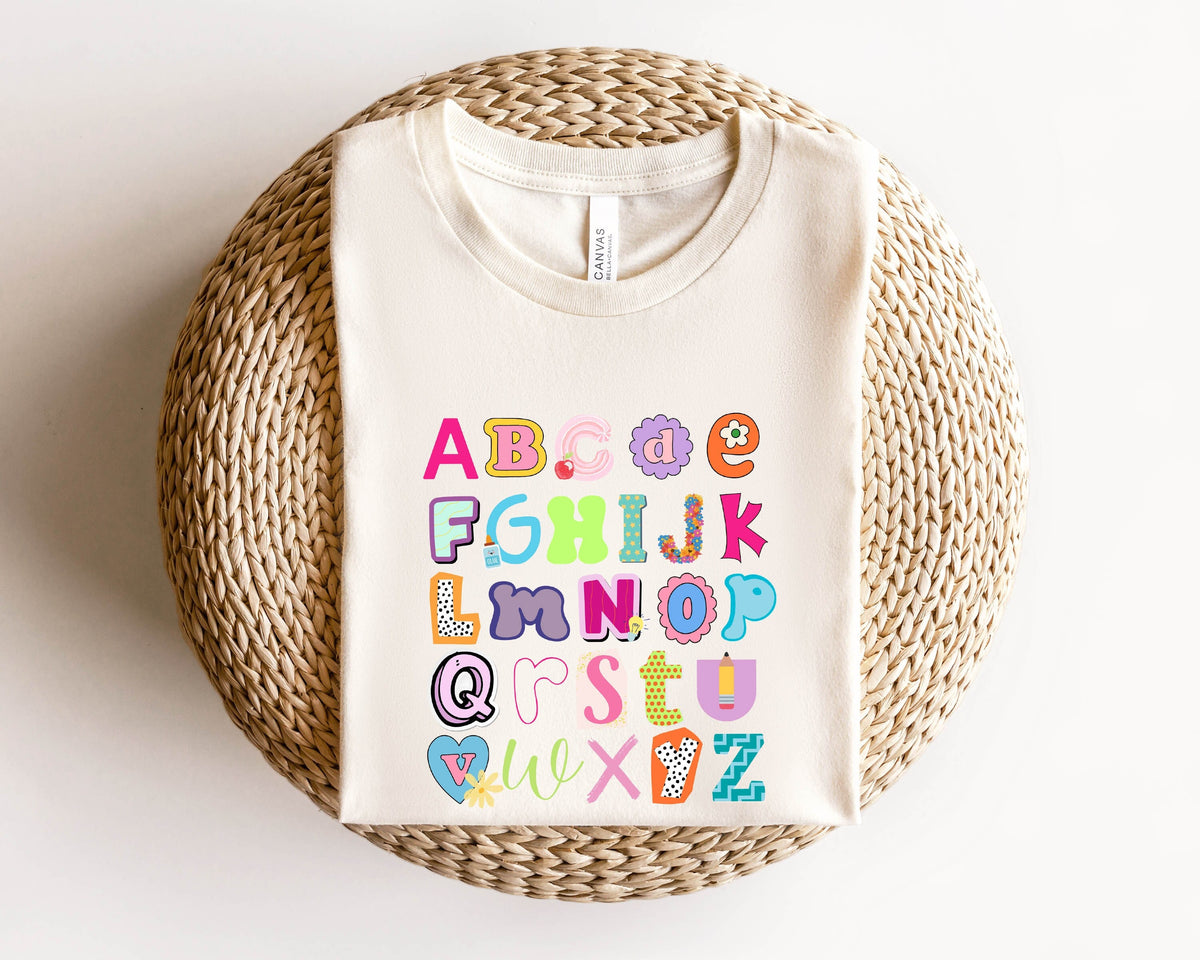 Alphabet Shirt Teacher Appreciation Teacher Gift 1st Grade Tshirt New Teacher Gift First Day Of School Abc Shirt First Grade Shirts Graphic Tee – Soft Feel · Top Pick For Any Outfit