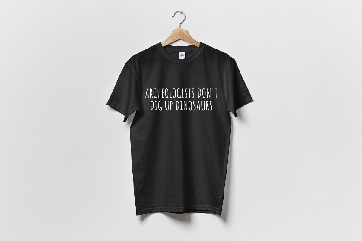 Funny Archeology Gift Archeologists Don39t Dig Up Dinosaurs Unisex Tee Graphic Tee – Soft Feel · Top Pick For Any Outfit
