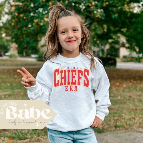 Kids In my Chiefs Era Youth Gildan crewneck sweatshirt Kansas City Football Distressed design Vintage Inspired Game Day Outfit Girls Sweatshirt – Soft Feel · Trending Graphic Apparel