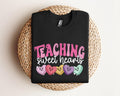 Valentines Day Teacher Sweatshirt Teaching Sweethearts Teacher Shirts Teacher Valentines Day GiftLove Teacher ShirtValentines Day Shirt Sweatshirt – Soft Feel · Top Pick For Any Outfit