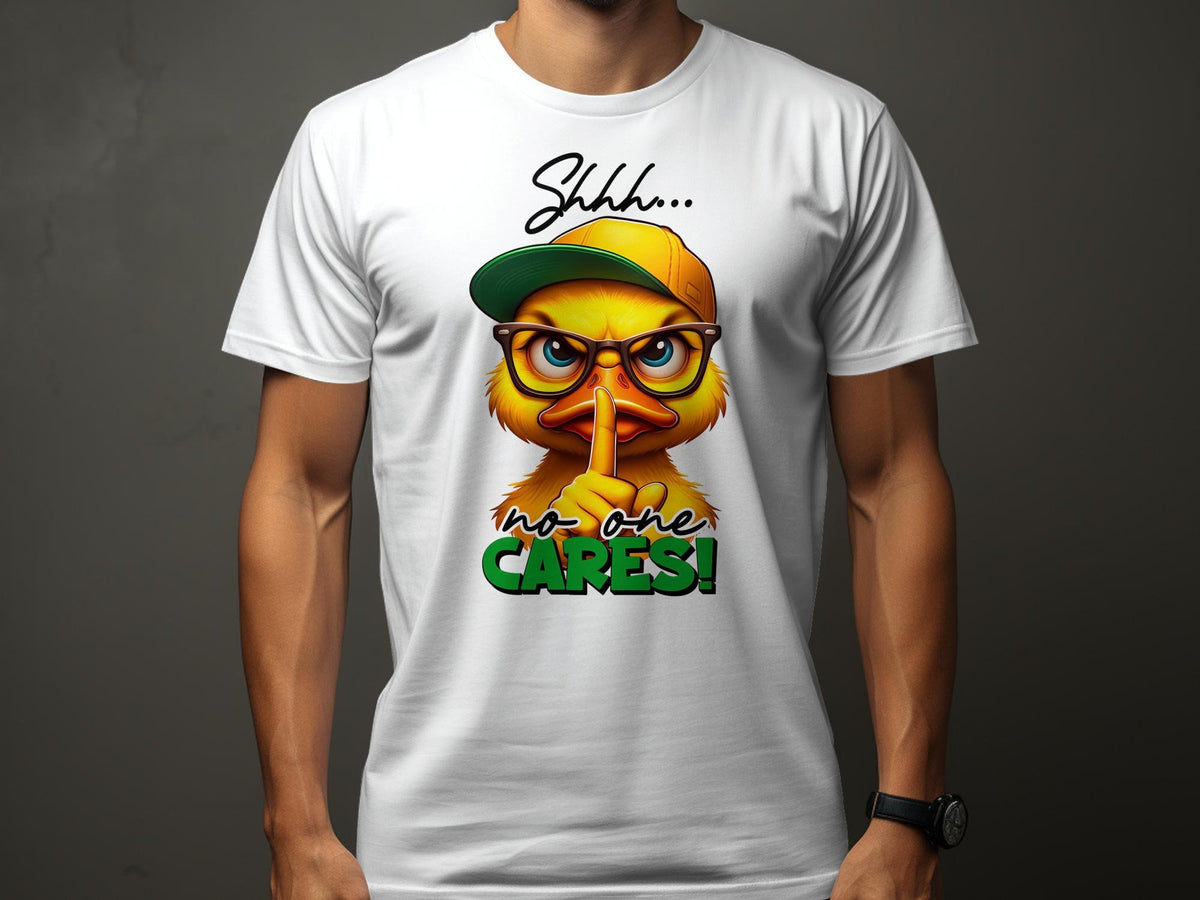 Funny Sarcastic TShirt Unisex Shhh No One Cares Yellow Duck with Glasses and Cap Graphic Tee – Fan Favorite · Top Pick For Any Outfit