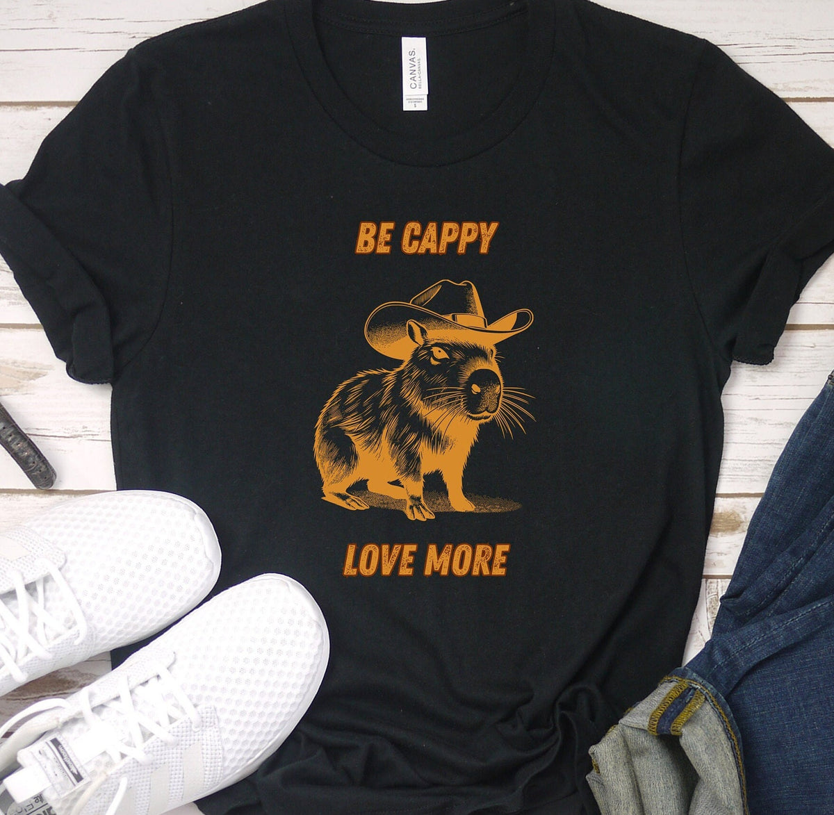 Be Cappy Love More Cowboy Cabybara Cute Tshirt Funny Capybara Gifted Shirt Gifted Capybara Lovers Gift Anime Capybara Gifts For Her Graphic Tee – Warm & Stylish · High-Quality Print