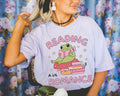 Cute Book Lover Tee Shirt for Romance Reader Who Loves Adorable 90s Vibes and Coquette Frogs Silly Bookish Romantasy Tee for Girly Bookworm Graphic Tee – Easygoing Wear · Top Pick For Any Outfit