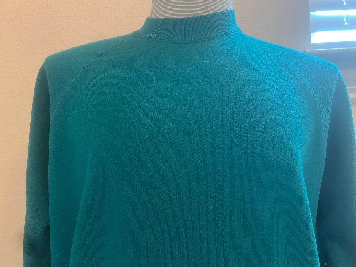 Vintage 9039s Blank Turquoise Crewneck Sweatshirt Size L Sweatshirt – Cozy Vibes · Trending Graphic Apparel