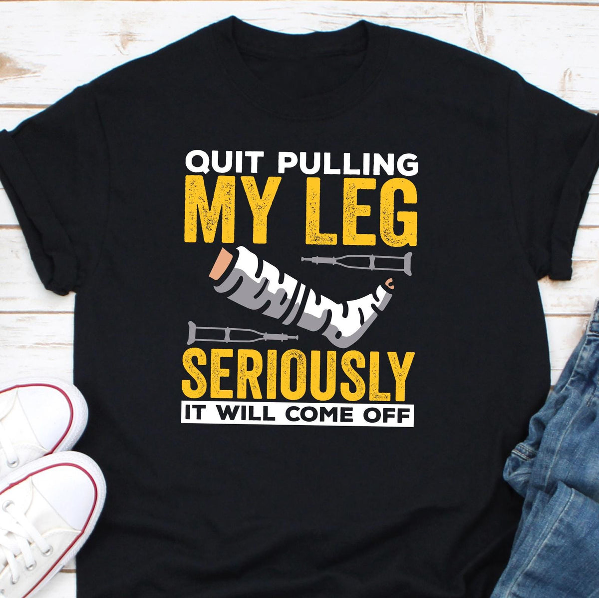 Quit Pulling My Leg Shirt Funny Leg Amputee Gift Funny Leg Injury Tshirt For Recovering Men Women Broken Leg Gift For Ankle Bone Injury Graphic Tee – Soft Feel · Perfect For Daily Wear
